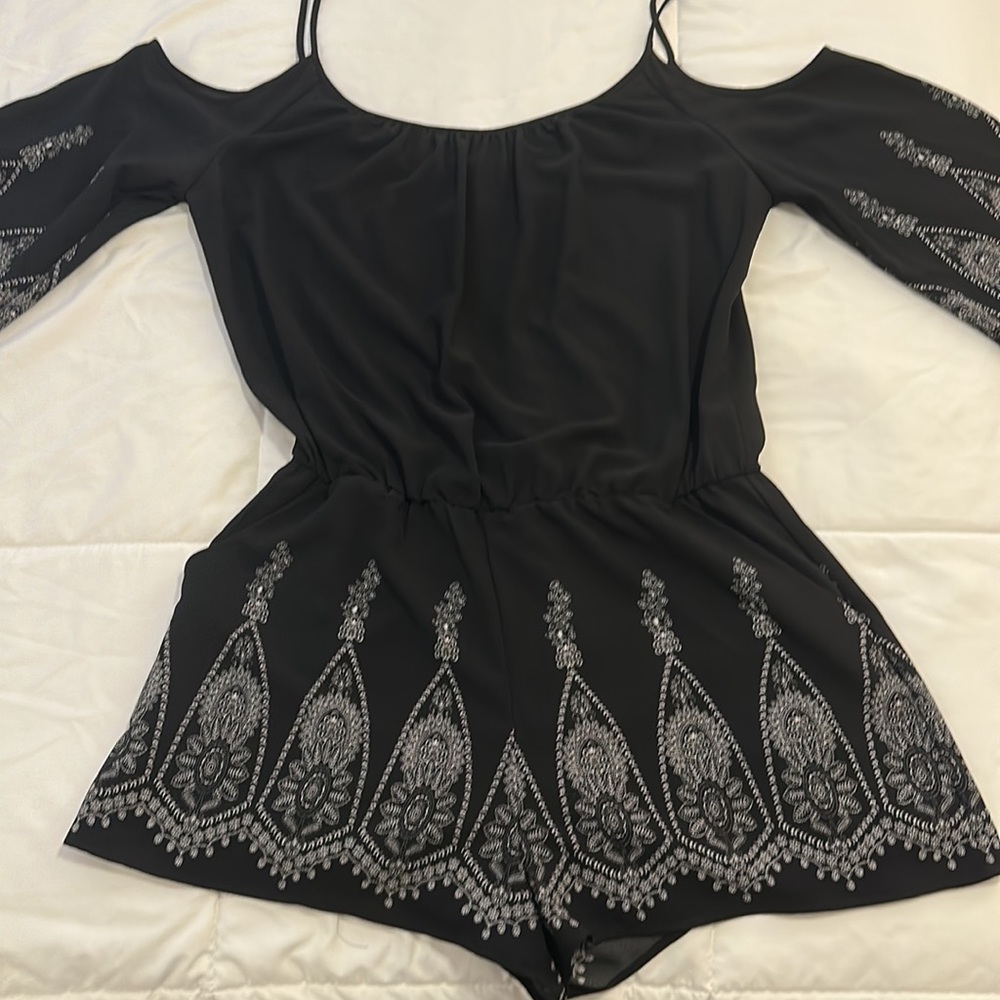 Black romper, white detailing